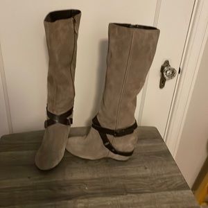 Sand colored suede boots.